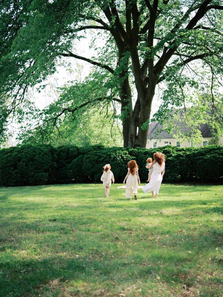 A family walking by Katie Stansfield Photography, a Glen Allen family photographer.