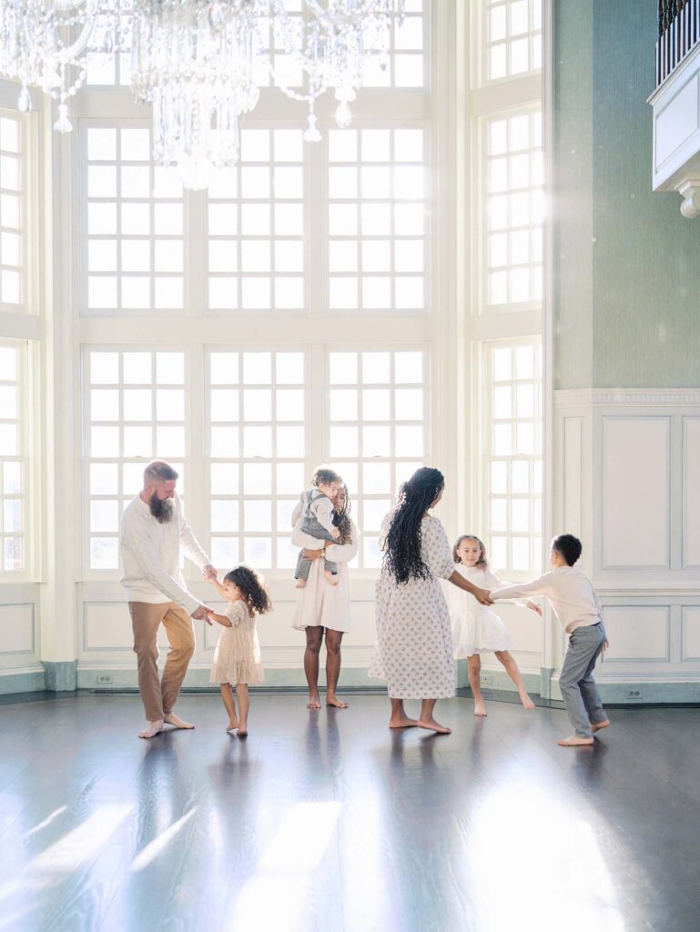 A family dancing by Katie Stansfield Photography, a Richmond photographer.