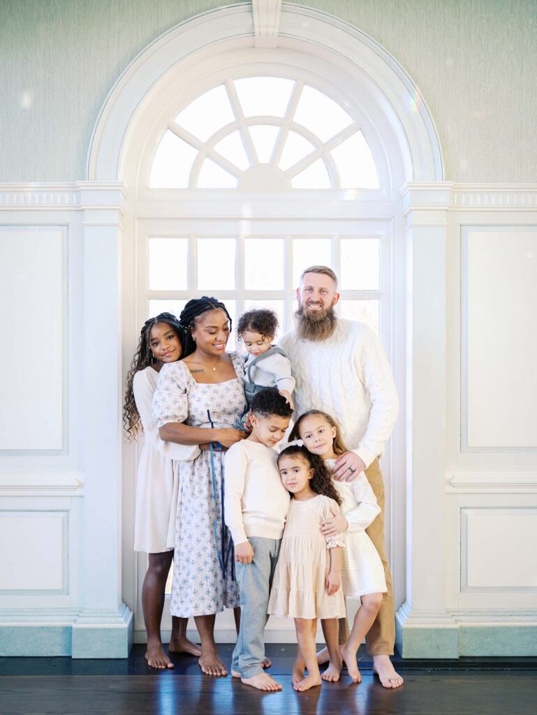 A family smiling at a family session by Katie Stansfield Photography, a Richmond photographer.