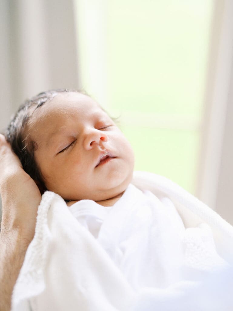 A baby sleeping during a session by Katie Stansfield Photography, a Chesterfield newborn photographer.